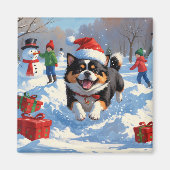 クリスマスの帽子をかぶって雪の中を走る日本狆 マグネット (正面)
