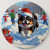 クリスマスの帽子をかぶって雪の中を走る日本狆 缶バッジ (正面)