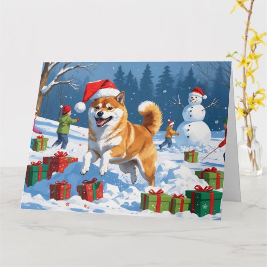 クリスマスの帽子をかぶって雪の中を走る柴犬 カード (黄色い花)