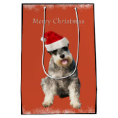 クリスマスの帽子を持つシュナウツァー ミディアムペーパーバッグ (裏面)