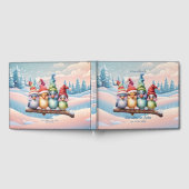 クリスマスの帽子を持つ可愛いファンタジー鳥。 ゲストブック (全面)