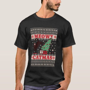 クリスマスの愛らしい猫が木から飛び降りる Xmas メオウィ カ Tシャツ