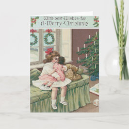 クリスマスの朝のツリーのプレゼントの女の子と人形 シーズンカード