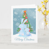 クリスマスの木を見るクリスマスウサギ カード (黄色い花)