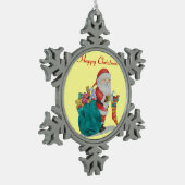 クリスマスの準備が整う緑の袋を持つサンタ スノーフレークピューターオーナメント (左)