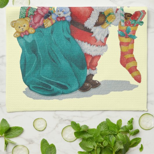 クリスマスの準備をしているかわいいサンタ キッチンタオル (折り畳み)