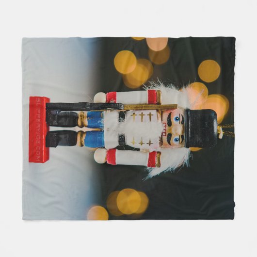 クリスマスの滑りやすいジョーくるみ割り人形オーナメント フリースブランケット (正面(横))