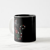 クリスマスの猫が雪の結晶を作った 面白い猫 ツートーンマグカップ (正面左)