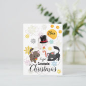 クリスマスの猫が雲と雪の結晶の中で踊る シーズンポストカード (スタンド正面)
