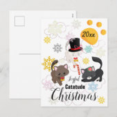 クリスマスの猫が雲と雪の結晶の中で踊る シーズンポストカード (正面/裏面)