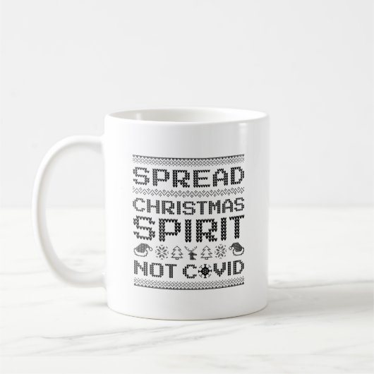 クリスマスの精神を塗り替える コーヒーマグカップ (左)