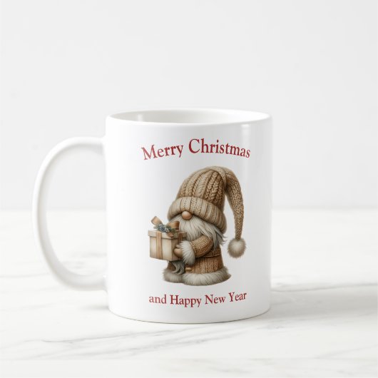 クリスマスの編み物 象牙色のノーム プレゼント コーヒーマグカップ (左)
