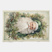 クリスマスの葉に囲まれたグリーンサンタクロース キッチンタオル (横)