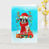 クリスマスの贈り物と雪の中の聖ベルナール カード (黄色い花)