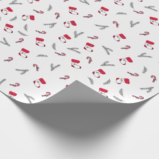 クリスマスの贈り物用ストッキングとペロペロキャンディーの模様 ラッピングペーパー (角)