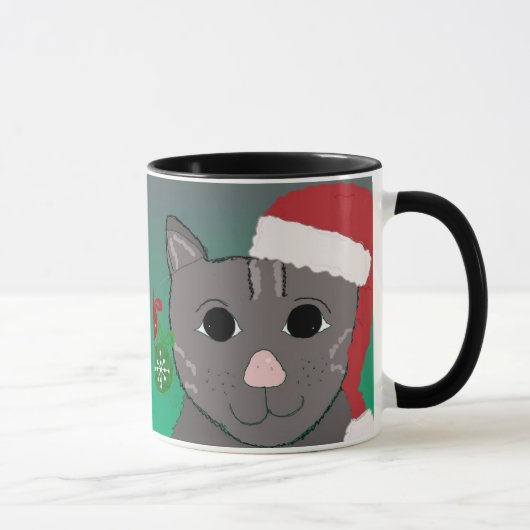 クリスマスの赤いサンタ帽子の猫 マグカップ (右)