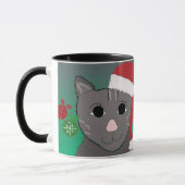 クリスマスの赤いサンタ帽子の猫 マグカップ (左)