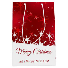 クリスマスの赤い冬の雪片 ミディアムペーパーバッグ