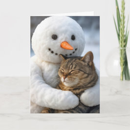 クリスマスの雪だるまがトラ猫を抱っこ カード