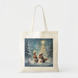 クリスマスの雪の中で遊ぶファンタジーなリスたち トートバッグ