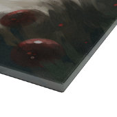 クリスマスの雪の中のヨーキプー犬 カッティングボード (角)