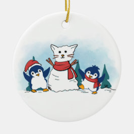 クリスマスの雪像ネコを作るペンギン セラミックオーナメント