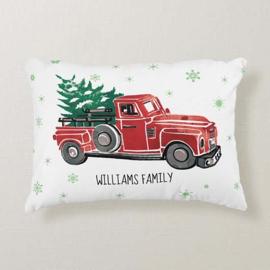 クリスマスの雪片のモノグラムが付いている赤いヴィンテージのトラック アクセントクッション (正面)