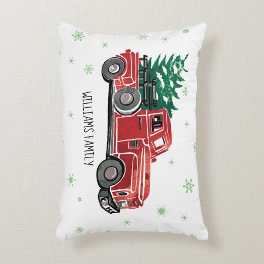 クリスマスの雪片のモノグラムが付いている赤いヴィンテージのトラック アクセントクッション (正面(垂直))