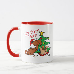 クリスマスの雰囲気ダックスフンドのマグカップ マグカップ