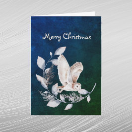 クリスマスの青いフクロウの葉と枝の水彩画 シーズンカード