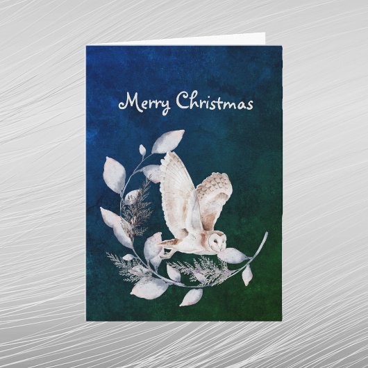 クリスマスの青いフクロウの葉と枝の水彩画 シーズンカード