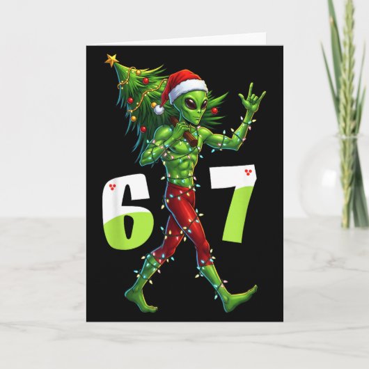 クリスマスの面白いエイリアンシックスセブンメーム 67 サンタ帽子 カード (正面)