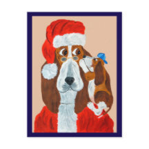クリスマスの願い事をサンタに伝えるバセット・ハウンドの子犬