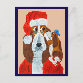 クリスマスの願い事をサンタに伝えるバセット・ハウンドの子犬 ポストカード