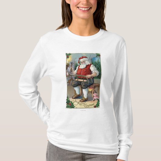 クリスマスのGreetingSantaの建物のそり Tシャツ (正面)