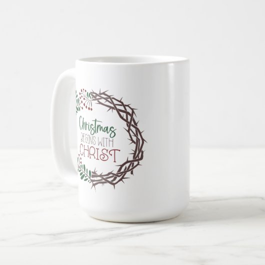 クリスマスはキリストから始まる聖なる書物、 経典リース コーヒーマグカップ (正面左)