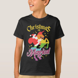 クリスマスは魔法 サンタのユニコーン乗り物 楽しい Tシャツ