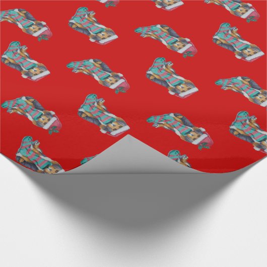 クリスマスを伴うかわいい黒と茶色の子犬ストッキング ラッピングペーパー (角)