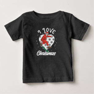 クリスマスを愛するスノーボードサンタクロース面白い ベビーTシャツ