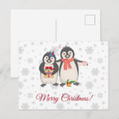 クリスマスを楽しむペンギンのカップル ポストカード (正面/裏面)
