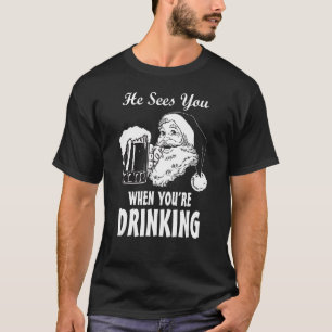 クリスマスを飲むとサンタに会おもしろいう Tシャツ