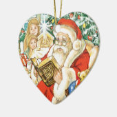 クリスマスイブの聖書を読んでいるサンタクロース セラミックオーナメント (左)