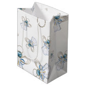 クリスマスエンジェル信仰のランダムなパターンのコラージュ ミディアムペーパーバッグ (正面アングル)