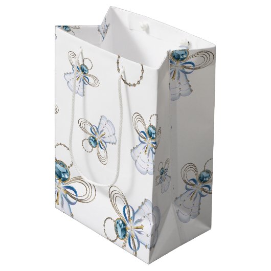 クリスマスエンジェル信仰のランダムなパターンのコラージュ ミディアムペーパーバッグ