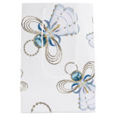 クリスマスエンジェル信仰のランダムなパターンのコラージュ ミディアムペーパーバッグ (裏面)