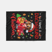 クリスマスオーナーのサンタ・ドッグにダックスフントが欲しい フリースブランケット (正面(横))