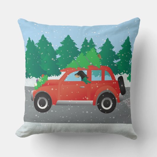 クリスマスカーを運転するブラックとタンのコンハウンド クッション (正面)