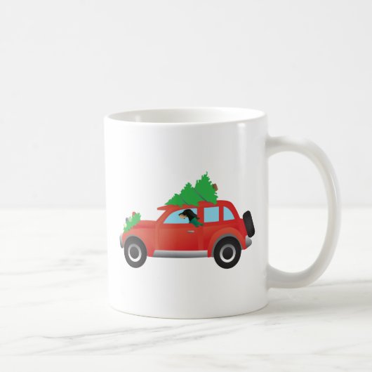 クリスマスカーを運転するブラックとタンのコンハウンド コーヒーマグカップ (右)
