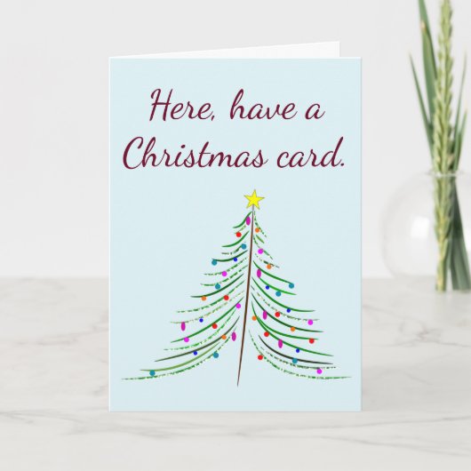 クリスマスカードを持って。今は離れ一人で… シーズンカード (正面)