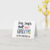 クリスマスグリーティングカードにユニコーンが欲しい カード (黄色い花)